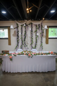 wedding chapel reception hall with bride and groom table